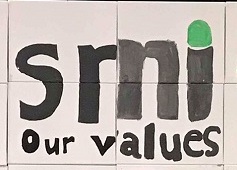 Painting created in corporate painting workshop featuring SMI logo.