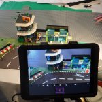 iPad on tripod filming Lego scene in Lego Animation team activity.