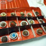 Box of chocolaes made in corporate chocolate making activity.