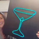 Holding cocktail glass design neon sign made in corporate neon sign making workshop.